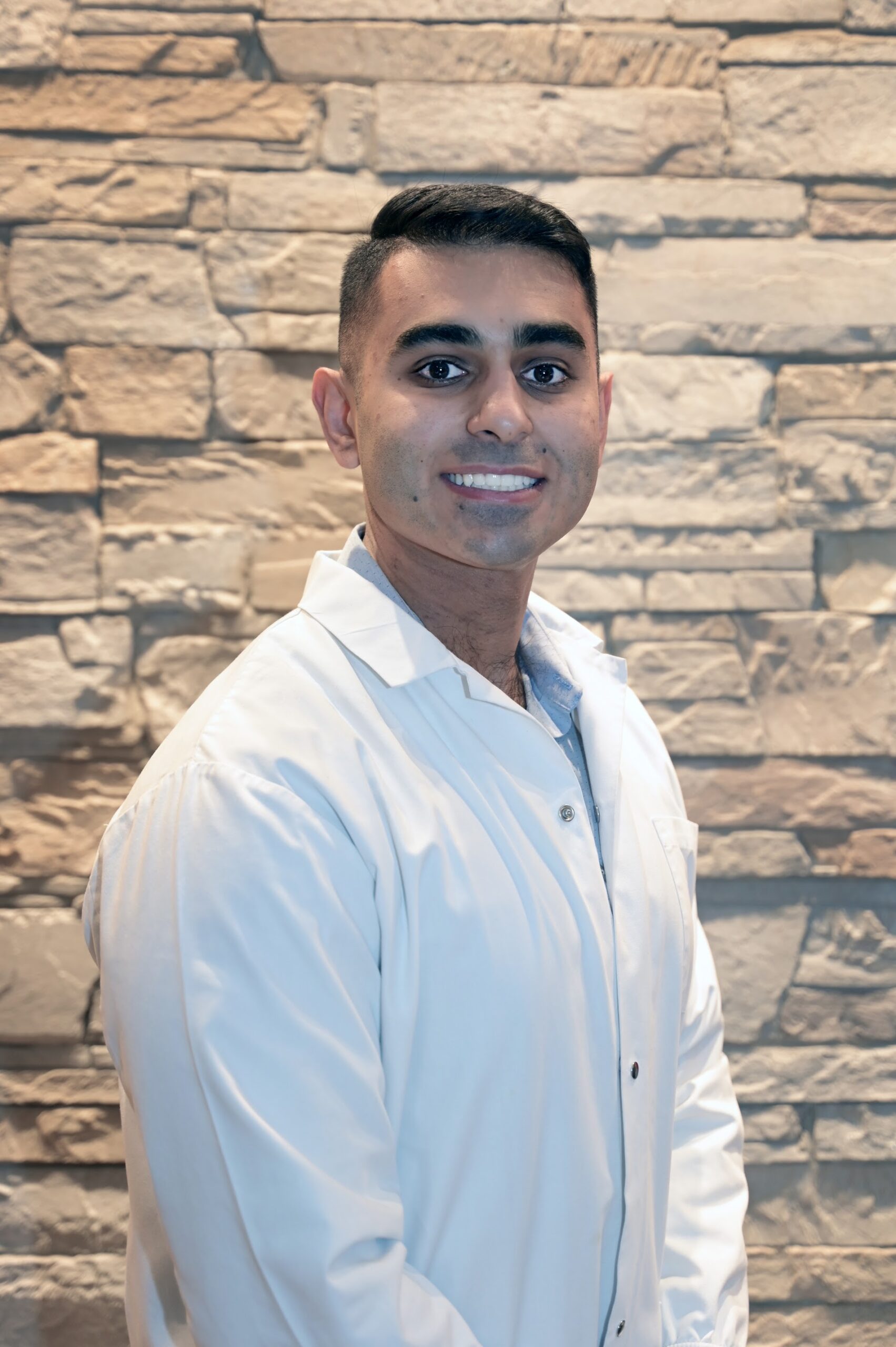 Homepage - Apple Wellness Dental Dr. Hammad Qasim